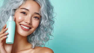 asian woman holding skincare bottle